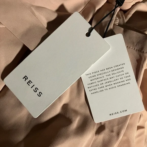 Elegant Beige Sleeveless Dress - Picture 6 of 9